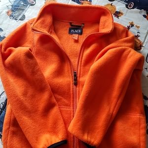 Orange zip up